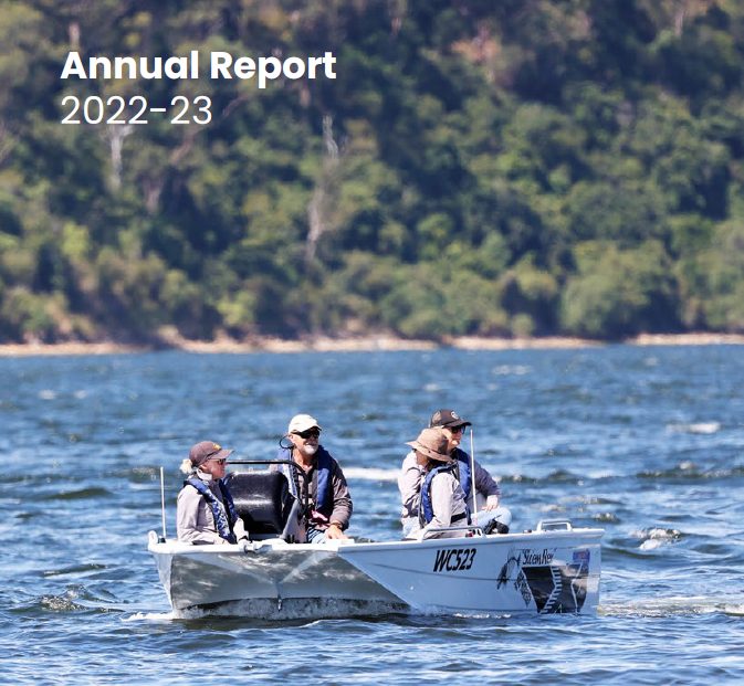 Trust for Nature's Annual Report, depicting four adults on a boat in a lake